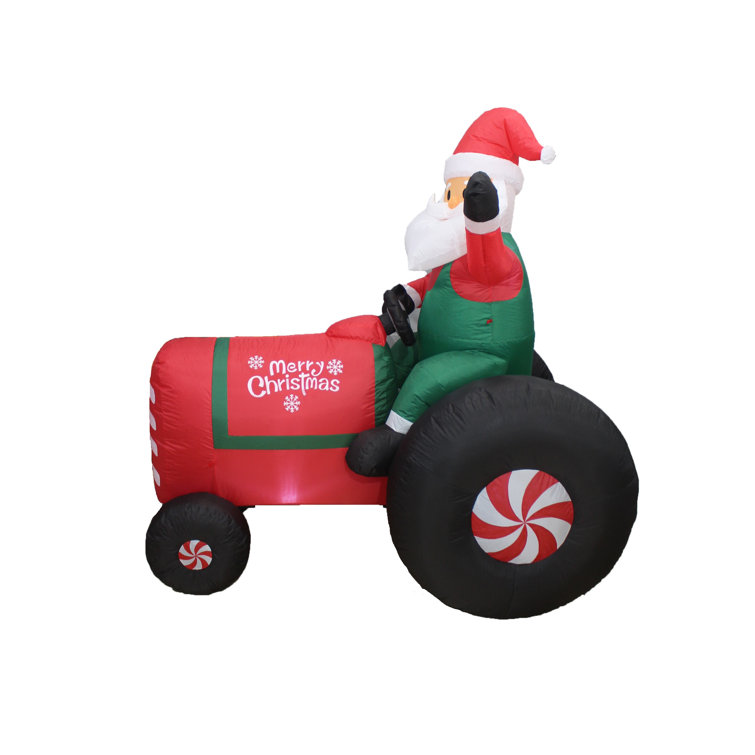 The Holiday Aisle® Santa Claus Drive Tractor Blow up Holiday Yard